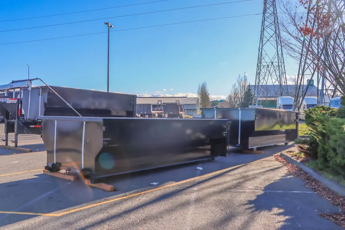 Roll-off dumpster ready for waste disposal at job site for 12 Yard Dumpster Rental in Sandersville